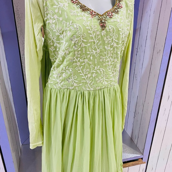 Full flaired beautifully embroidered pastel green gown for party wear - Picture 8 of 11